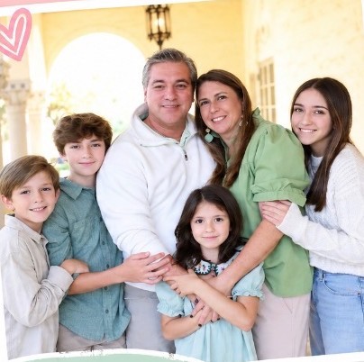 Amy with her husband and their four children